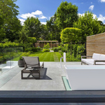 Blizzard cold plunge package from Primal Plunges shown in a luxury backyard