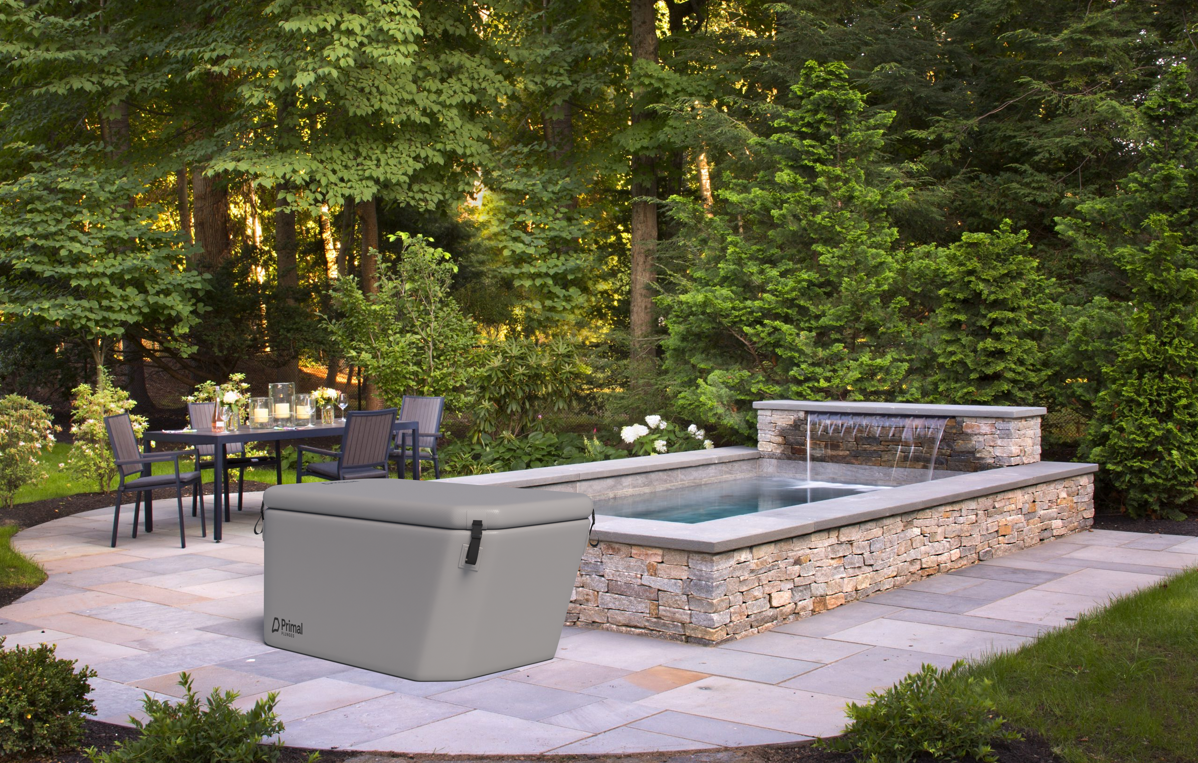 Tunda inflatable cold plunge from Primal Plunges shown in a custom home backyard 